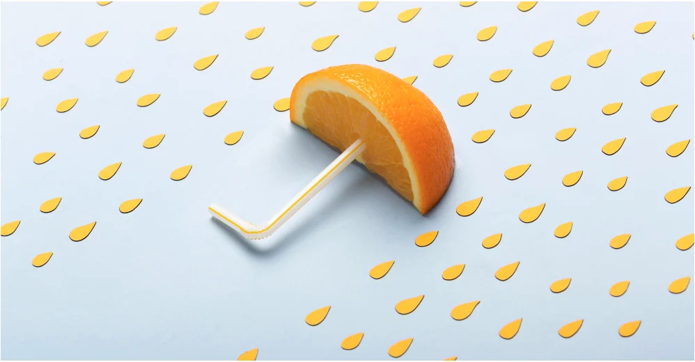 Creative campaign artwork — orange slice on blue